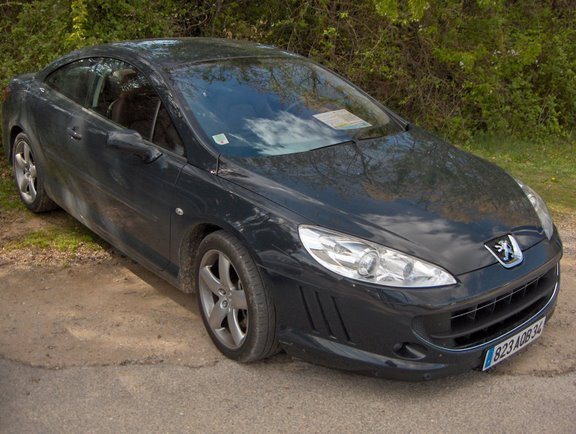 http://www.forum-peugeot.com/Forum/mesimages/10982/407 coupe gris hurricane.jpg